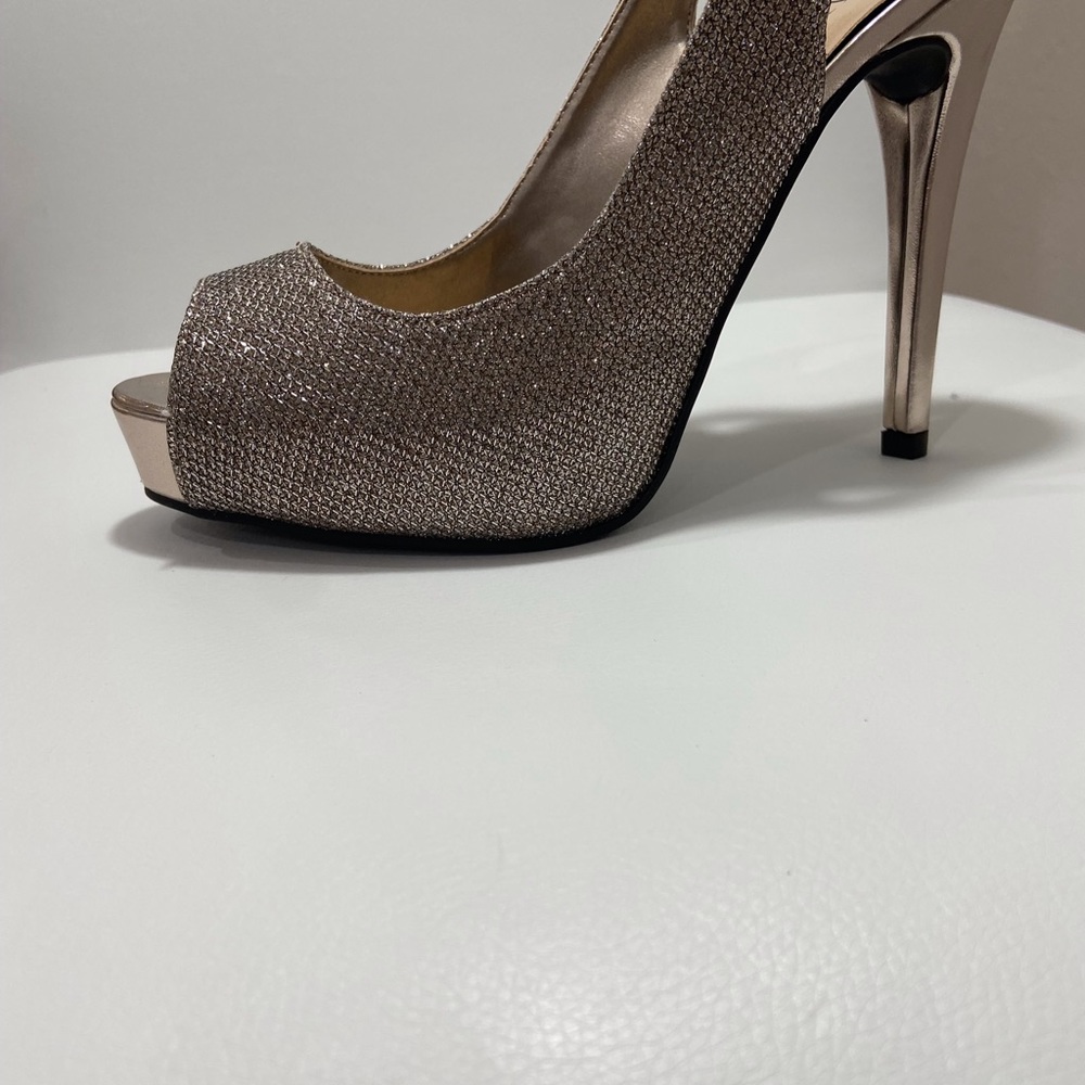 Guess women's light gold pink high-heeled shoes, size 6.5